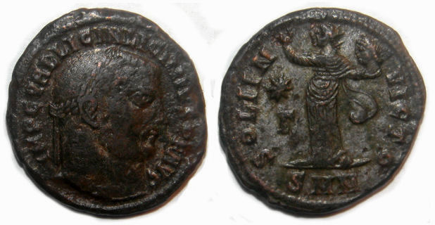 Licinius I Follis : SOLI INVICTO : Sol holding head of Serapis